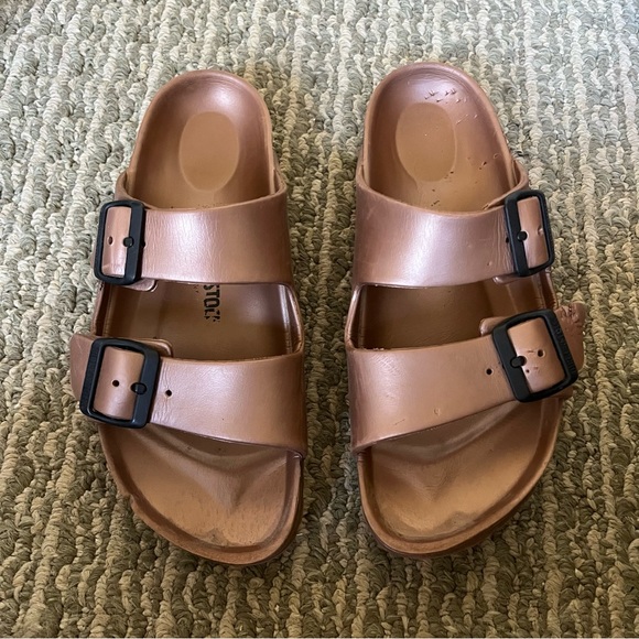 Birkenstock Tan Sandals with Black Buckles - Picture 1 of 10